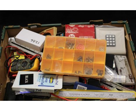 Box of assorted parts accessories and tools for railway layout or model makers.