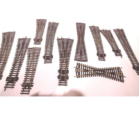 Eleven assorted Peco and Hornby points including 3 way mostly good/used. P&amp;P Group 1 (£14+VAT for the first lot and £1+VA