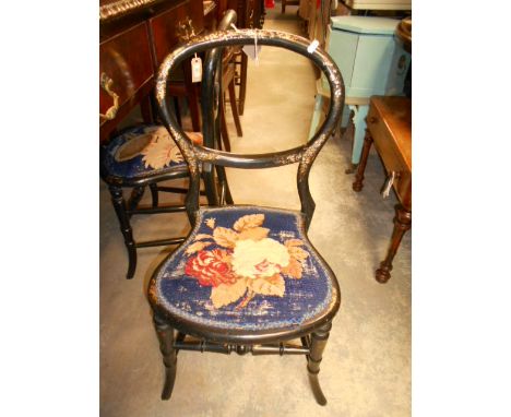 A pair of 19th C black lacquered balloon back side chairs, both inlaid with mother of pearl and abalone to backs and floral t