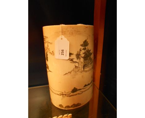 A worked ivory vase having pictorial scene of pagoda's river and mountains