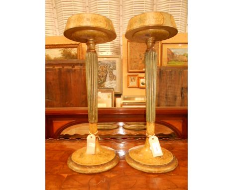 A pair of circular hand-painted and crackle glazed smokers stands decorated with floral sprays and reeded column supports
