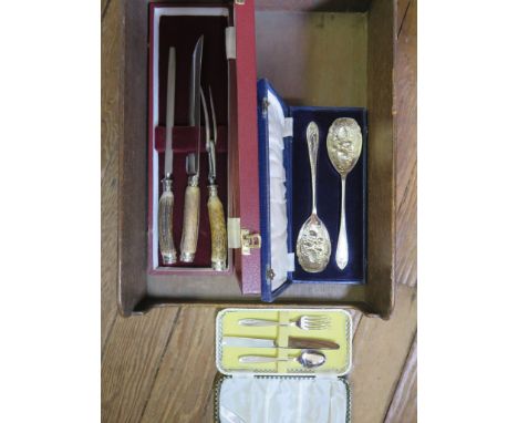 A cased carving set with horn handles silver plated by Edwin Blyde &amp; Co Sheffield, a cased pair of silver plated berry sp