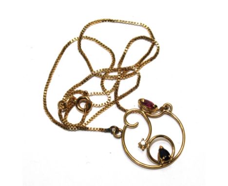 A ruby, diamond and sapphire pendant on 18 carat gold neck chain 