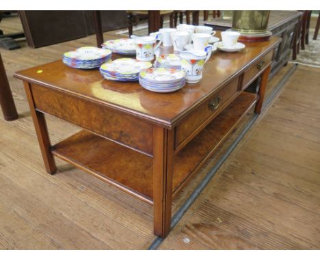 A reproduction cross banded burr walnut coffee table, by Iain James Furniture, with two frieze drawers and an under shelf, 11