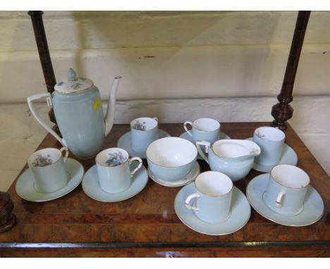 A Royal Worcester Woodland pattern coffee service, with seven coffee cans, small ashtray and saucers