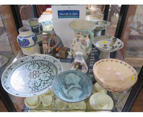 A Bursley Ware Charlotte Rhead design bowl, 19 cm diameter, a Poole Pottery vase, 16 cm high, Royal Doulton vase and a figure