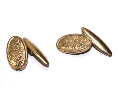 A pair of back and front cufflinks
