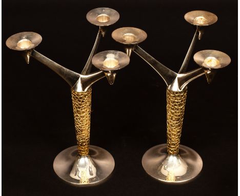 Stuart Devlin (1931-2018), a pair of silver and silver-gilt three-light candelabra, maker's mark and hallmarks for London 197