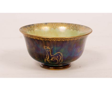 A Wedgwood Fairyland lustre bowl, the exterior with gilt animal designs on mottled brown ground, the interior with a butterfl