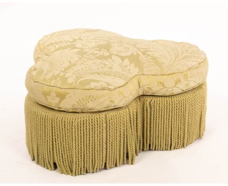 A George Smith cloverleaf pouffe upholstered in pale green floral damask with long tassel fringing, on castors, 88cm diameter