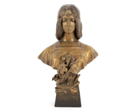 Goldscheider/Purete/an Art Nouveau painted and gilt terracotta bust, modelled as a maiden with downcast eyes and floral hairb