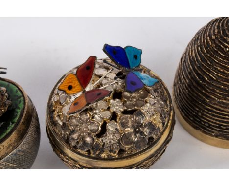 Stuart Devlin (1931-2018), a silver, silver gilt and enamel surprise egg, London 1975, textured and containing enamel butterf