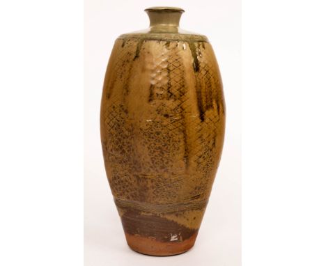 Phil Rogers (1951-2020), a stoneware bottle vase, the facetted sides with latticework, ash glaze, impressed mark, 38cm high C