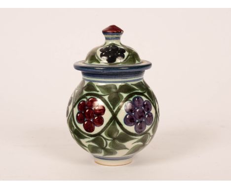 Laurence McGowan (born 1942), a lidded stoneware jar, coloured flowers and foliage, painted signature, 16.5cm high CONDITION 