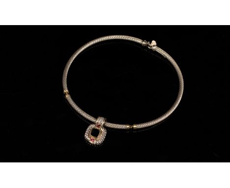 David Yurman, a silver pendant necklace, the necklace of cable form with 14k yellow gold collars, the gem set pendant of squa