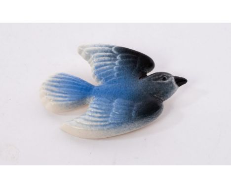 Poole Pottery, an Art Deco style ceramic Bluebird brooch, inscribed verso 270/500 and monogrammed