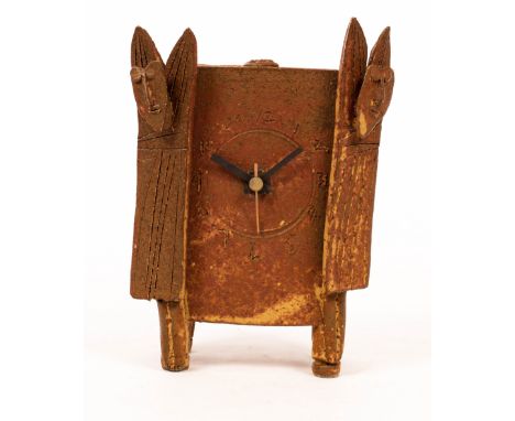 John Maltby (1936-2020), a stoneware mantel clock, with incised dial and two abstract figures to sides, impressed seal mark M
