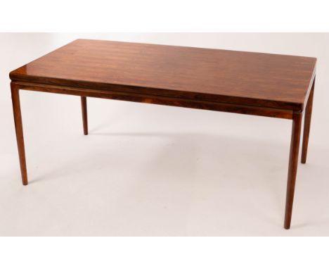 Johannes Andersen for Christian Linneberg, Denmark, an extendable rosewood dining table on tapering legs, with two additional