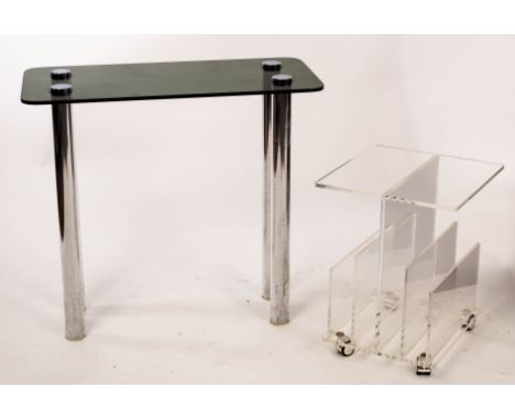 A 20th Century console table, smoked rectangular glass top with rounded corners on chrome legs and a perspex magazine rack on