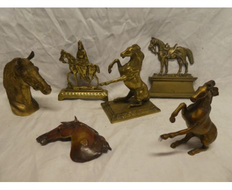 Two various brass horse door stops, two heavy brass rearing horse figures and two others (6)