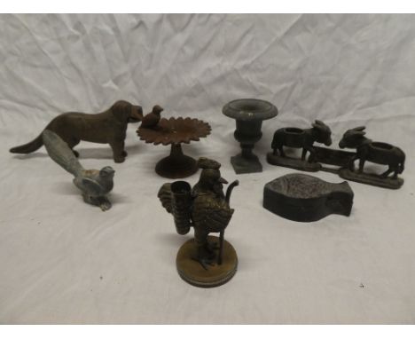 A small cast iron bird bath, cast iron dog nutcrackers, small lead bird, modern bronzed rooster match holder and other figure