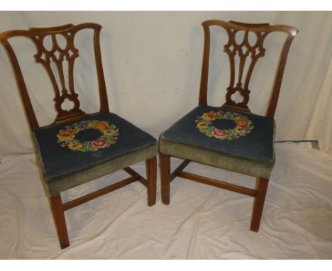 A pair of 19th Century beech and elm Chippendale-style dining chairs with pierced vase splat backs and floral tapestry seats 