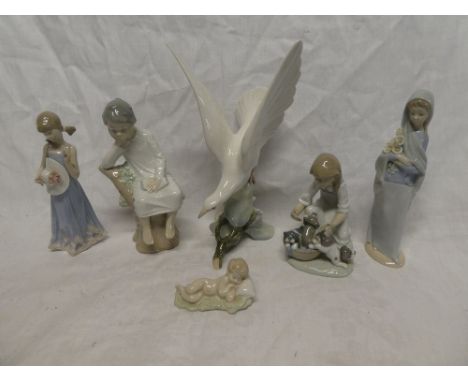 Six china Lladro figures including dove, seated child, young girl with puppies, etc