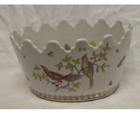 A Eastern-style oval china planter with painted bird decoration, 11½" long
