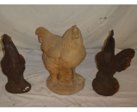 A terracotta garden chicken figure, 20" high and two cast iron garden chicken figures (3)