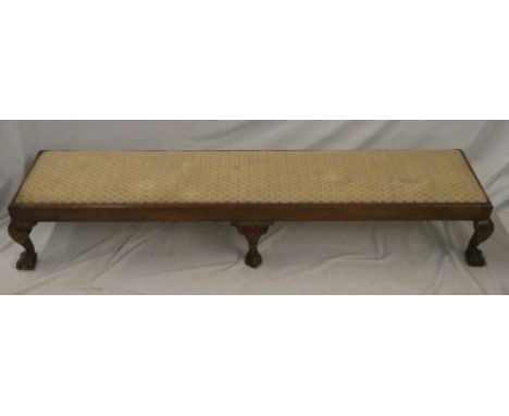 A mahogany long fender stool with tapestry upholstered seat on cabriole legs 56" long