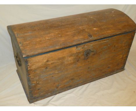 An old pine domed trunk with hinged lid and iron handles 42" long