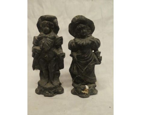 A pair of 19th Century lead figures of a male and female, 7½" high