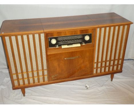 A 1960s Golm stereograme with in-built radio, record player and mirror-lined cocktail cabinet