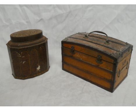An unusual old biscuit tin in the form of a cabin trunk "Biscuits Lefevre Utile", 8½" long and one other metal biscuit tin by