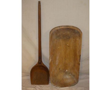 A 19th Century pine rectangular washing trough, 31" long and a 19th Century wooden grain shovel (2)