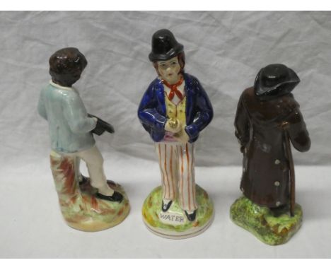 Three various 19th Century Staffordshire pottery character figures including double sided "Gin/Water", elderly man with stick