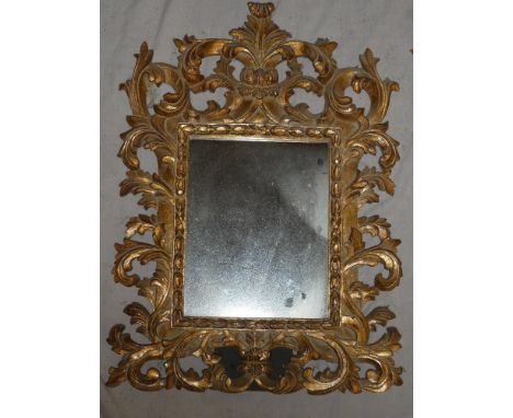 A good quality modern gilt rectangular easel dressing mirror with scroll decorated frame, 21" x 15"