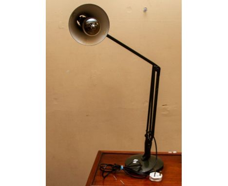 Mid 20thC Anglepoise lamp. Metal arms on a heavy base. Dark green.