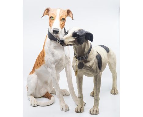 Pair of large ceramic greyhounds (Ht 44cm and 37cm)