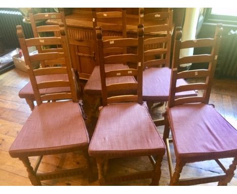 A Rupert Griffiths set of six joined oak ladder back dining chairs, in the Arts and Crafts manner, with five horizontal rails