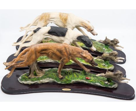 3 ceramic greyhound figures. Length 46cm