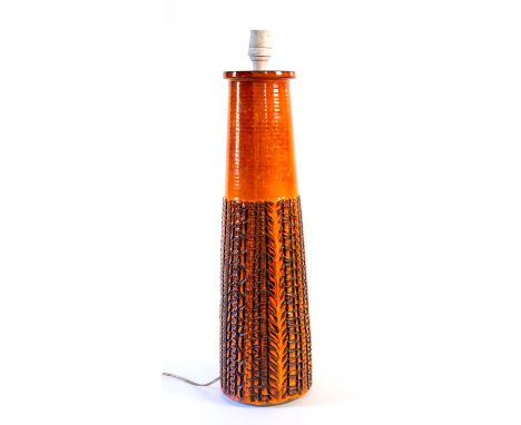 A large 1970's Poole pottery lamp, orange and dark brown. Height 54cms