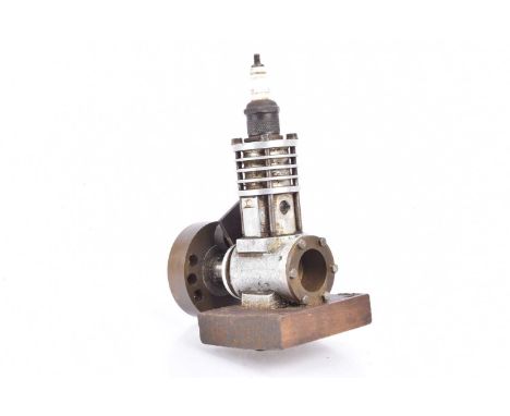 A small Two-stroke air-cooled Petrol Engine, of unknown design and possibly built by Mr H Jones of Arundel, measuring 7" high