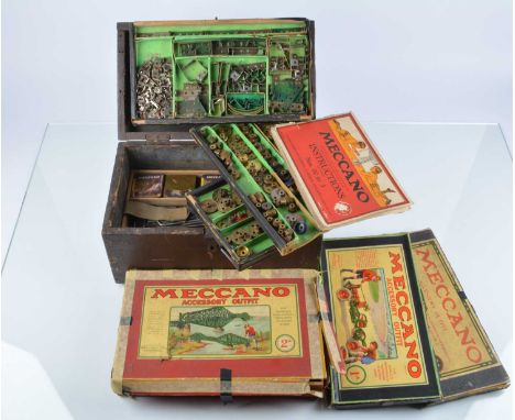 Circa 1930 Meccano outfits,  Accessory Outfit 1A with palin label and another 1A with two boys building a racing car label, 2