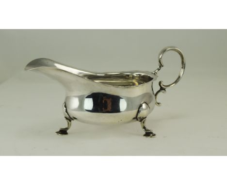 A Nice Quality Silver Helmet Shaped Cream Jug, with Hoofed Feet and Plain Body. In Excellent Condition. Hallmark Sheffield 19