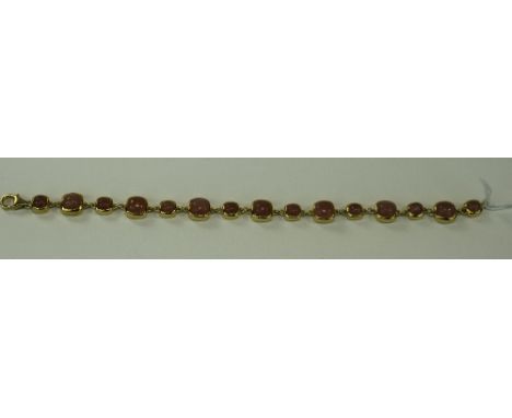 Peach Moonstone Line Bracelet, with cushion cuts of two alternating sizes totalling 16.75cts, set in 14ct gold vermeil and si