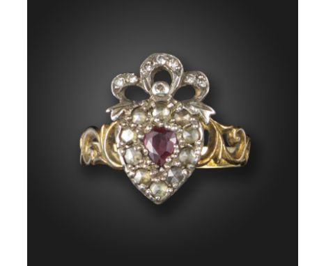 A George III ruby and diamond cluster ring, the heart-shaped cluster centred with a pear-shaped ruby within a surround of ros