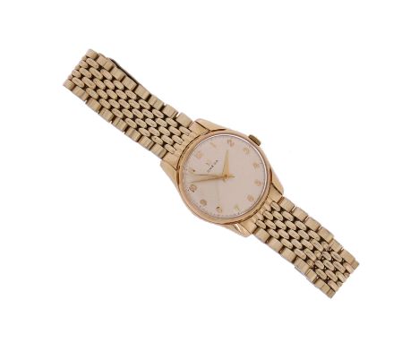 A gentleman's yellow gold wristwatch by Omega, the signed dial applied with gold Arabic numerals and sweep seconds hand, manu