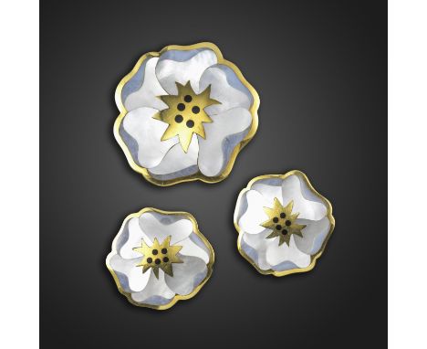 A suite of gem-set gold pansy jewellery by Tiffany &amp; Co., c.1980, comprising a brooch and a pair of earrings, the petals 