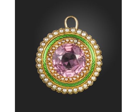 An Edwardian gem-set and enamel suffragette pendant, the circular pink tourmaline is set within concentric surrounds of seed 